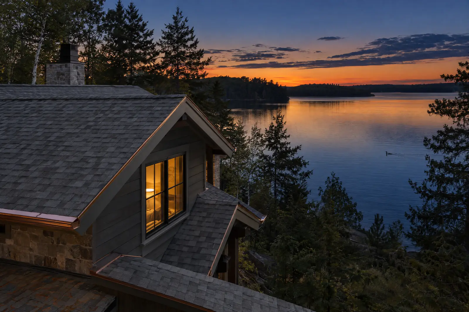 A finished roof over a lake at dusk